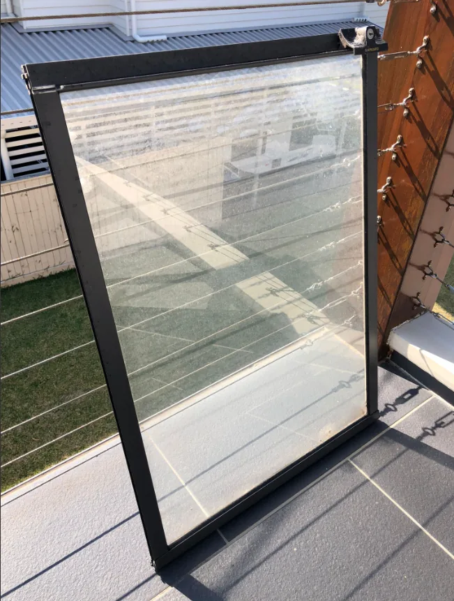 A glass balustrade panel cleaned and clear